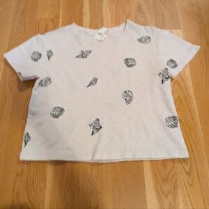 Anthropologie Beige Tee with Black Seashells